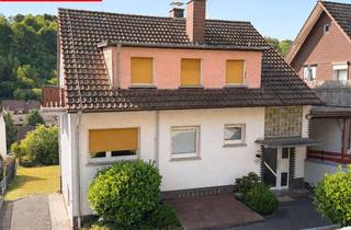 Haus kaufen in 63619 Bad Orb, 3-Parteienhaus mit Garten & Fernblick – ideal für Eigennutzer oder Kapitalanleger