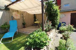 Einfamilienhaus kaufen in 39240 Calbe, VB: Charmantes Einfamilienhaus mit zusätzlicher Einnahmequelle durch Gewerbeeinheit