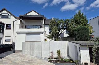Einfamilienhaus kaufen in 63165 Mühlheim, Freistehendes Einfamilienhaus mit Gewerbeeinheit im Herzen von Mühlheim am Main