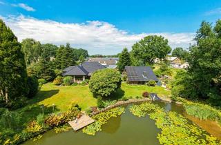 Haus kaufen in 24980 Meyn, Parkähnliches Anwesen mit modernisiertem Bungalow, Gästehaus und Schwimmteich