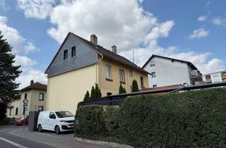 Anlageobjekt in 61440 Oberursel, Oberursel: Attraktives Wohn- und Geschäftshaus mit Entwicklungspotenzial