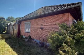 Einfamilienhaus kaufen in 24955 Harrislee, Sanierungsbedürftiges Einfamilienhaus mit Anbau