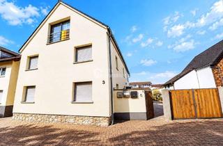 Haus kaufen in 64859 Eppertshausen, Zwei attraktive Wohneinheiten in Eppertshausen– modernisiert & vollständig vermietet