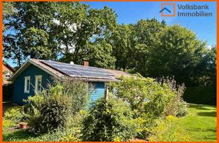 Haus kaufen in 26817 Rhauderfehn, Holzhaus auf nicht einsehbarem Gartengrundstück in Collinghorst!