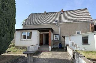Einfamilienhaus kaufen in 39435 Borne, Handwerker gesucht! Sanierungsbedürftiges Einfamilienhaus mit großem Grundstück und Nebengebäuden