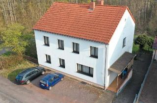 Haus kaufen in 66333 Völklingen, Völklingen - Freistehendes Zweifamilienhaus mit großem Grundstück