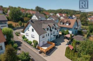 Wohnung kaufen in Blumenstraße 30, 97261 Güntersleben, Sanierte Eigentumswohnung mit Terrasse und Garten