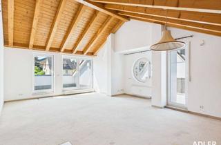 Wohnung kaufen in 70825 Korntal-Münchingen, Lichtdurchflutete 2-Zimmer-Dachgeschosswohnung mit Dachterrasse, Aufzug & Duplexparker