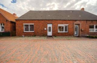 Doppelhaushälfte kaufen in 26736 Krummhörn, Ein Zuhause zum Verwirklichen – Doppelhaushälfte mit Garten und freiem Blick ins Grüne