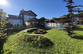 Haus kaufen in Am Hollerberg 10, 36381 Schlüchtern, Sukzessive modernisiertes Zweifamilienhaus mit Gartenidylle, Nebengebäude (Halle) und Doppelgarage