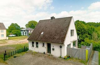 Einfamilienhaus kaufen in 23611 Bad Schwartau, Charmantes Einfamilienhaus mit zwei Terrassen und viel Gestaltungspotenzial in Bad Schwartau