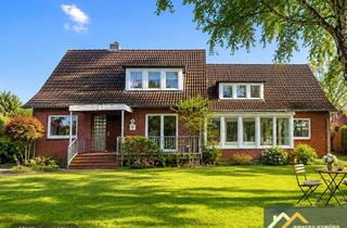 Haus kaufen in 25436 Tornesch, Zweifamilienhaus mit großem Grundstück in Tornesch