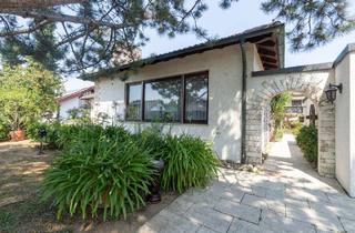 Haus kaufen in 74385 Pleidelsheim, Stilvoller Bungalow in ruhiger Sackgasse mit Garten, Terrasse und Garage