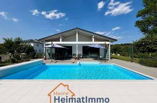 Haus kaufen in 89447 Zöschingen, Modernes Wohnen auf einer Ebene – Stilvoller Bungalow mit Pool in Zöschingen