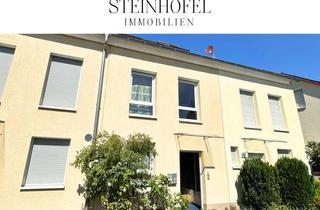 Reihenhaus kaufen in 65428 Rüsselsheim, Modernes KfW-60-Reihenhaus mit exklusivem Wellnessbereich und PV-Anlage in Königstädten