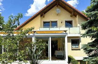 Haus kaufen in 86836 Untermeitingen, Extravagantes Haus mit zwei Wohnungen, Wintergarten, Terrasse und Garage in Untermeitingen zu kaufen