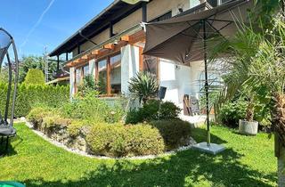 Wohnung kaufen in 83109 Großkarolinenfeld, Wohnen mit Garten: 3-Zimmer-Wohnung mit Wintergarten und Garage