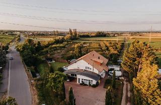 Mehrfamilienhaus kaufen in 67229 Gerolsheim, Gerolsheim - Exklusives Mehrfamilienhaus in Außenlage