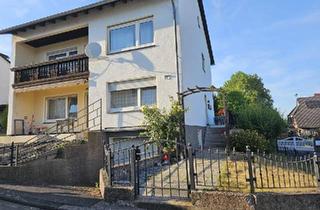 Haus kaufen in 34369 Hofgeismar, Hofgeismar - Gepflegtes Zweifamilienhaus - EG sofort frei, Kamin