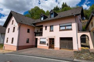 Einfamilienhaus kaufen in 54597 Plütscheid, Zwei Familienhäuser, zwei Garagen & 2.842 m² Grundstück – vielseitiges Anwesen in Plütscheid