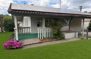 Haus kaufen in 86573 Obergriesbach, Charmantes Holzhaus in ruhiger Lage von Obergriesbach mit idyllischen Garten u. praktischen Carport