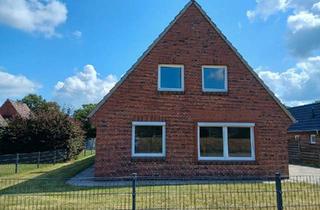 Einfamilienhaus kaufen in 25774 Lunden, Lunden - Einfamilienhaus mit pflegeleichtem Grundstück am Sportplatz
