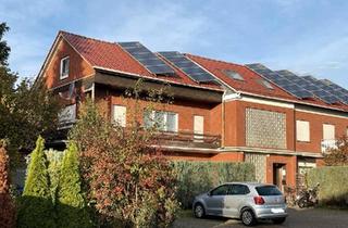 Mehrfamilienhaus kaufen in 49624 Löningen, Löningen - 7,07%-Nettorendite- Mehrfamilienhaus mit 9 WE + 5 Garagen zu verk