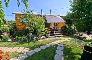 Haus kaufen in 55262 Heidesheim, Traumhafter Garten mit Tiny House am Blauen See – ganzjährig nutzbar