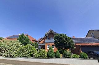 Einfamilienhaus kaufen in 97532 Üchtelhausen, Üchtelhausen - Großzügiges Einfamilienhaus mit offenem Wohnkonzept, Kamin, PV-An