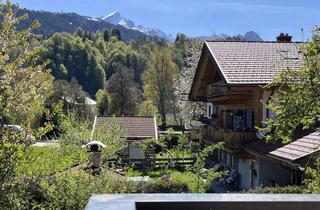 Wohnung kaufen in 82467 Garmisch-Partenkirchen, Herrlicher Bergblick*Ruhig*Sonnendurchflutet*Kachelofen*3 Zi.+Garage+priv. Hobbyraum mit Bad*1.OG