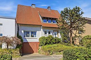 Haus kaufen in 59269 Beckum, Wohnen & Arbeiten in Beckum: Gepflegtes Familienhaus mit modernem Gewerbeanbau