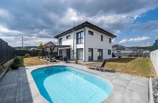 Haus kaufen in 79793 Wutöschingen, Exklusives Anwesen mit Pool & großzügigem Garten – neuwertiger Wohntraum aus 2021