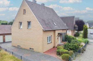 Haus kaufen in 33775 Versmold, Sofort bezugsfrei: Tolles Zweifamilienhaus mit Garten und 2 Garagen in Versmold-Bockhorst