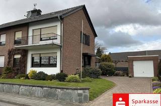 Einfamilienhaus kaufen in 41352 Korschenbroich, Einfamilienhaus aus den 60er-Jahren mit Wintergarten und Balkon