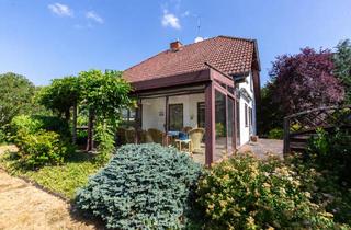 Haus kaufen in 35447 Reiskirchen, Charmantes Wohnhaus mit Wintergarten und schönem Garten