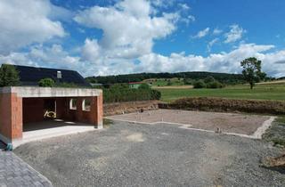 Grundstück zu kaufen in 33014 Bad Driburg, Baugrundstück mit Baugenehmigung für einen Bungalow mit Einliegerwohnung in Bad Driburg-Alhausen