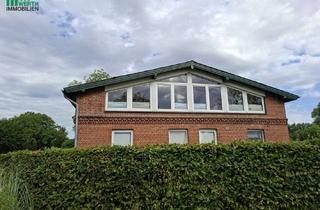 Wohnung kaufen in 25792 Strübbel, Charmante Wohnung mit Gestaltungspotenzial, Kamin und Loggia mit Feldblick