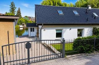 Doppelhaushälfte kaufen in Heinitzstraße 13, 15562 Rüdersdorf, Direkt am Wasser: Doppelhaushälfte mit eigenem Bootsanleger, Terrasse & Nebengebäude