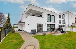 Einfamilienhaus kaufen in 79415 Bad Bellingen, Modernes Einfamilienhaus mit außergewöhnlicher Architektur