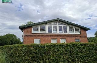 Wohnung kaufen in 25792 Strübbel, Charmante Wohnung mit Gestaltungspotenzial, Kamin und Loggia mit Feldblick