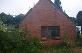Haus kaufen in 24354 Rieseby, Rieseby - Kleines Haus auf großem Grundstück mit Garage zu verkaufen