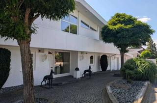 Penthouse kaufen in 31515 Wunstorf, MGK bietet Großenheidorn: Penthousewohnung mit großzügiger Dachterrasse und Blick ins Grüne