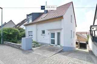 Wohnung kaufen in 67551 Horchheim, Ebenes Gartenglück & Kaminfeuer: Modernisierte 2-Zimmer-Wohnung mit Terrasse & Carport