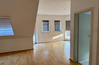Wohnung kaufen in Wolfsheck, 69254 Malsch, Wohnen mit Charakter: 3-Zimmer-Dachgeschosswohnung in Malsch