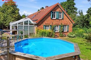 Einfamilienhaus kaufen in 26624 Südbrookmerland, Großzügiges Einfamilienhaus mit 240 m² Wohnfläche, großem Grundstück und vielseitigen Möglich
