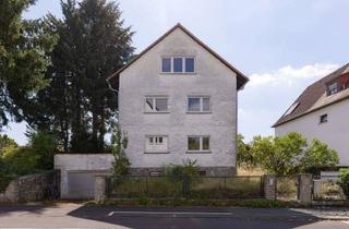 Mehrfamilienhaus kaufen in 61350 Bad Homburg, Mehrfamilienhaus mit Entwicklungspotenzial auf sonnigem Grundstück in familienfreundlicher Lage von