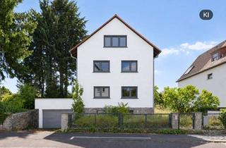 Mehrfamilienhaus kaufen in 61350 Bad Homburg, Mehrfamilienhaus mit Entwicklungspotenzial auf sonnigem Grundstück in familienfreundlicher Lage von
