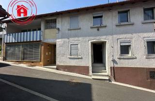 Einfamilienhaus kaufen in 97950 Großrinderfeld, Einfamilienhaus mit Nebengebäude im Ortskern von Schönfeld