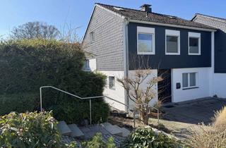 Doppelhaushälfte kaufen in 40822 Mettmann, Familienfreundliche Splitlevel Doppelhaushälfte auf großzügigem Sonnengrundstück in ruhiger Lage