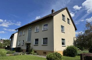 Haus kaufen in 37539 Badenhausen, *Voll vermietetes 3-Fam.-Haus mit Balkonen und Garten sowie 5 Garagen in Badenhausen*